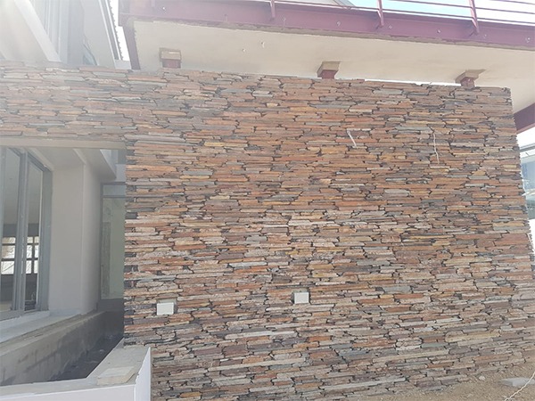 Stone cladding feature